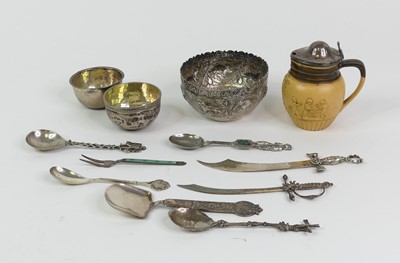 Lot 314 - A collection of white metal items, to include...