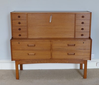 Lot 1333 - A 1960s Danish teak bureau cabinet having a...