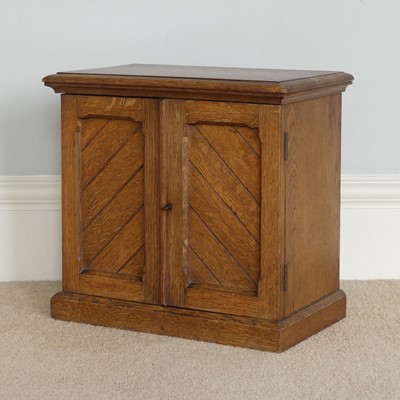 Lot 1312 - A late Victorian oak table top double door...
