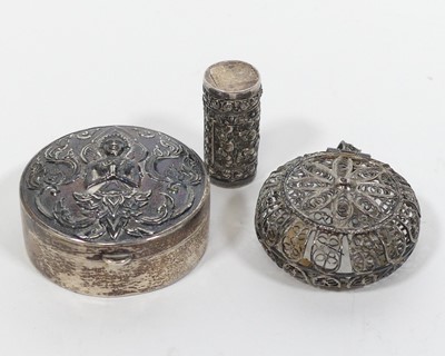 Lot 416 - An Indian white metal pill box repousse...