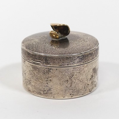 Lot 315 - A white metal trinket box, of cylindrical...