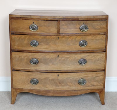 Lot 1288 - A Regency flame mahogany bow front chest of...
