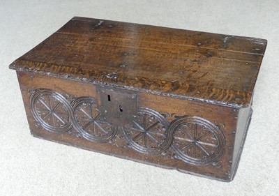 Lot 1330 - A 17th century and later relief carved oak...