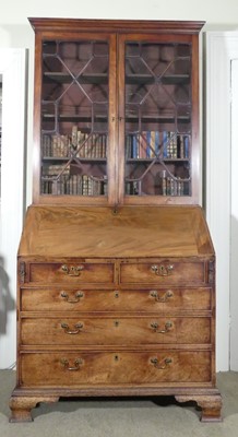 Lot 1316 - A George III mahogany bureau bookcase having...