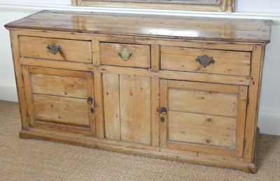 Lot 1302 - A Victorian stained pine dresser base having...