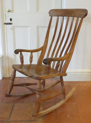 Lot 1332 - A circa 1900 elm and beech slat back farmhouse...