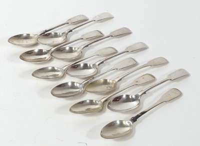 Lot 403 - A matched set of eleven silver teaspoons, in...