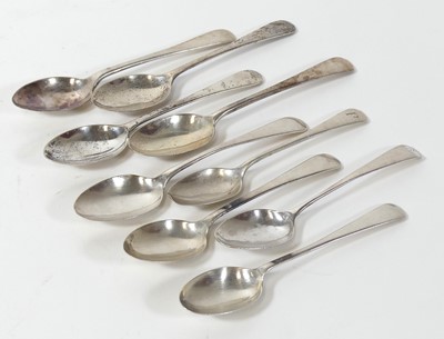 Lot 397 - A matched set of nine silver teaspoons, in the...