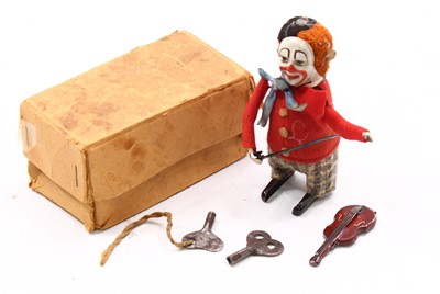 Lot 1997 - Schuco tinplate boxed clockwork figure of a...