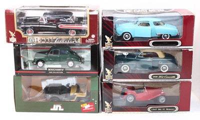 Lot 2129 - A collection of 1:18 scale cars to include 4x...