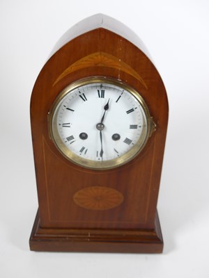 Lot 7 - An Edwardian walnut cased mantel clock, of...