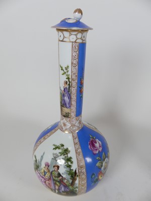 Lot 29 - A pair of continental bottle vases and covers,...