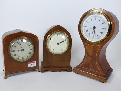 Lot 40 - An Edwardian walnut and satinwood inlaid...