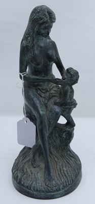 Lot 48 - A Verdigris metal figure of a mother and child,...