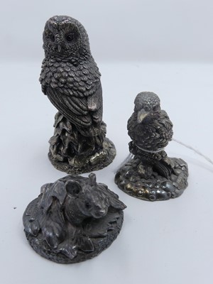 Lot 451 - An Elizabeth II filled silver model of an owl,...