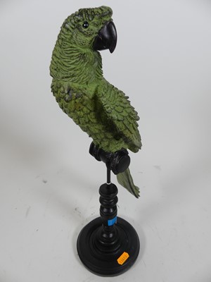 Lot 161 - A modern composite model of a green parrot...