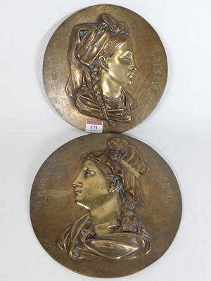 Lot 171 - A pair of 19th century French brass portrait...