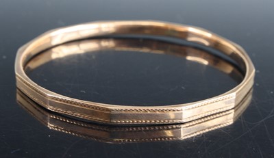 Lot 336 - A 9ct hollow gold bangle, 9.4g, dia. 7.5g