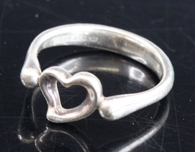 Lot 339 - A Tiffany & Co. Elsa Peretti silver heart ring,...