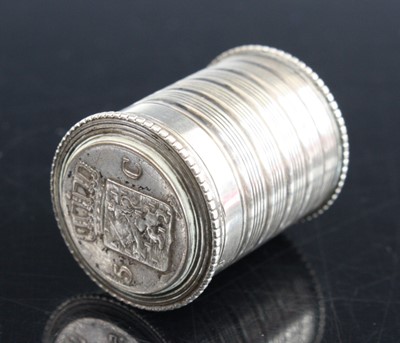 Lot 342 - A white metal coin case, height 23mm