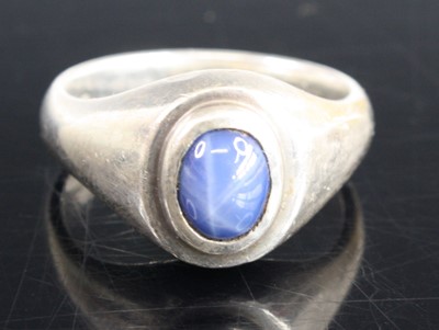 Lot 357 - A modern silver and cabochon star sapphire set...