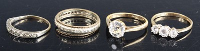 Lot 370 - A 9ct gold platinum white stone set solitaire...