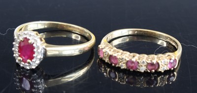 Lot 371 - A modern 9ct gold ruby and diamond point oval...