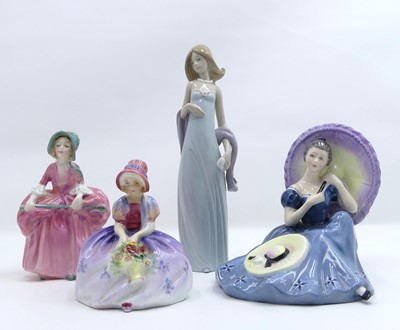 Lot 231 - A collection of three Royal Doulton figures of...