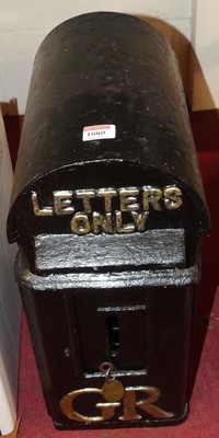 Lot 1072 - A George V cast iron letter box, being later...