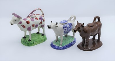 Lot 70 - A Swansea cow creamer, circa 1830, having pink...