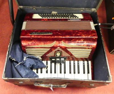 Lot 611 - A mid-20th century Unisella Worldmaster piano...