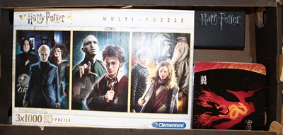 Lot 1546 - Two trays containing Harry Potter related...