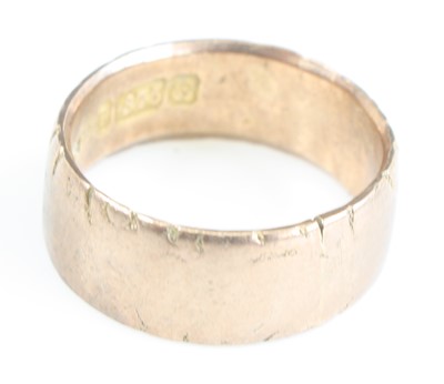 Lot 386 - A ladies 9 carat gold wedding band, size K, 4.4g.