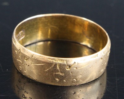 Lot 387 - A lady's late Victorian 18 carat gold wedding...