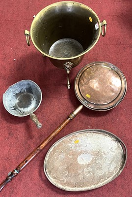 Lot 629 - An Edwardian brass coal scuttle, flanked by...