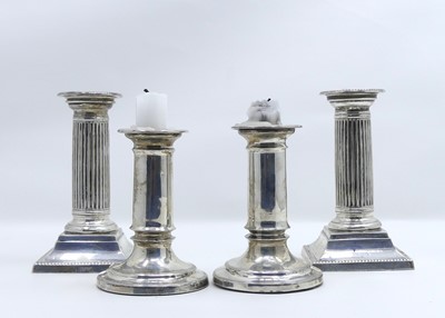 Lot 258 - A pair of Edward VII silver table candlesticks,...