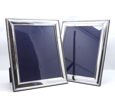 Lot 270 - A pair of Carrs beaded silver easel photograph...