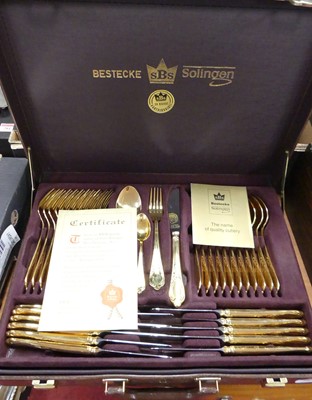 Lot 282 - A canteen of Solingen gold plated cutlery