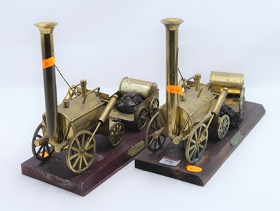 Lot 556 - Two brass models of Stevenson's Rocket, each h....