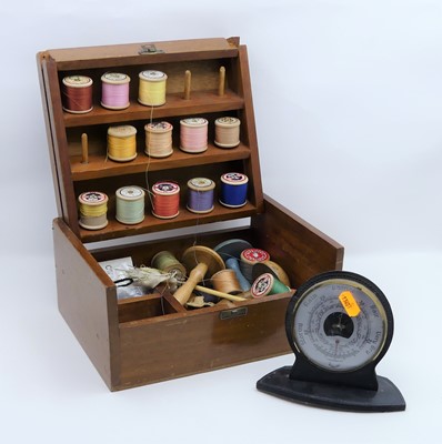 Lot 564 - A 20th century sewing box and contents;...