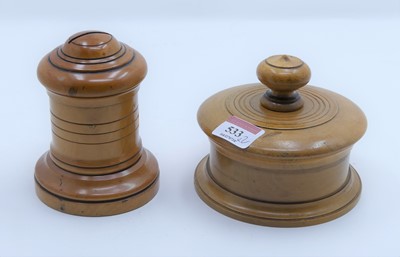 Lot 533 - A turned treen money-box, h.12cm; together...