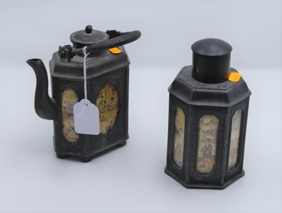 Lot 518 - A Chinese metal teapot, inset with panels...