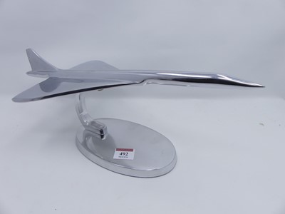 Lot 492 - A modern metal Concorde desk ornament, length...