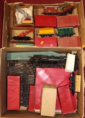 Lot 1673 - Two boxes containing O gauge related trains, ...