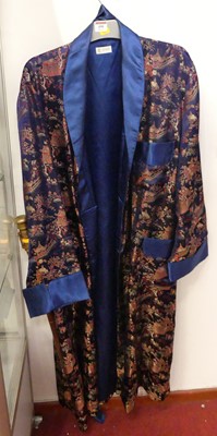 Lot 490 - A Cathaya embroidered silk gown, in the...