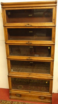 Lot 1154 - A 1930s Globe Wernicke walnut five-tier...