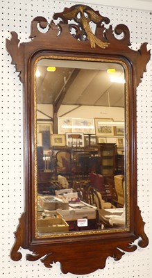 Lot 1167 - A circa 1900 mahogany fret-cut wall mirror in...