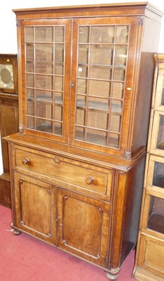 Lot 1184 - An early Victorian mahogany secretaire...