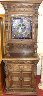 Lot 1166 - A circa 1900 heavily carved Flemish oak...