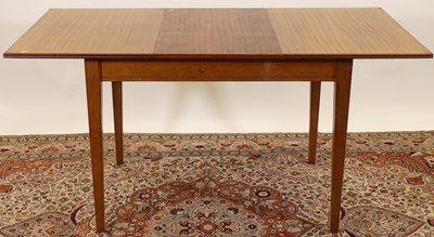 Lot 1211 - A 1960s Gordon Russell teak extending dining...